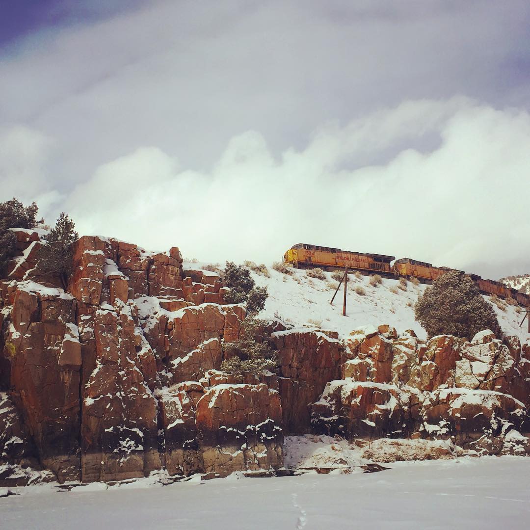 Chilling at the #hotsprings and a #train came past. #coloradoriver #colorado