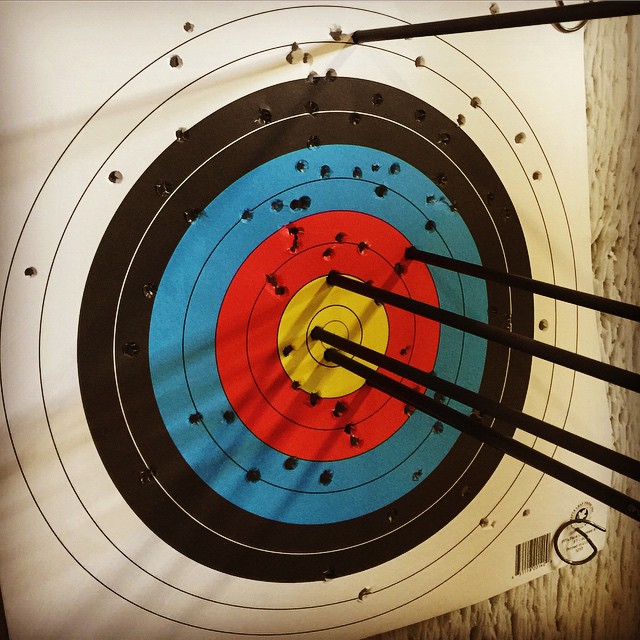 First day with the new bow. Nice grouping except for that stray one up top.