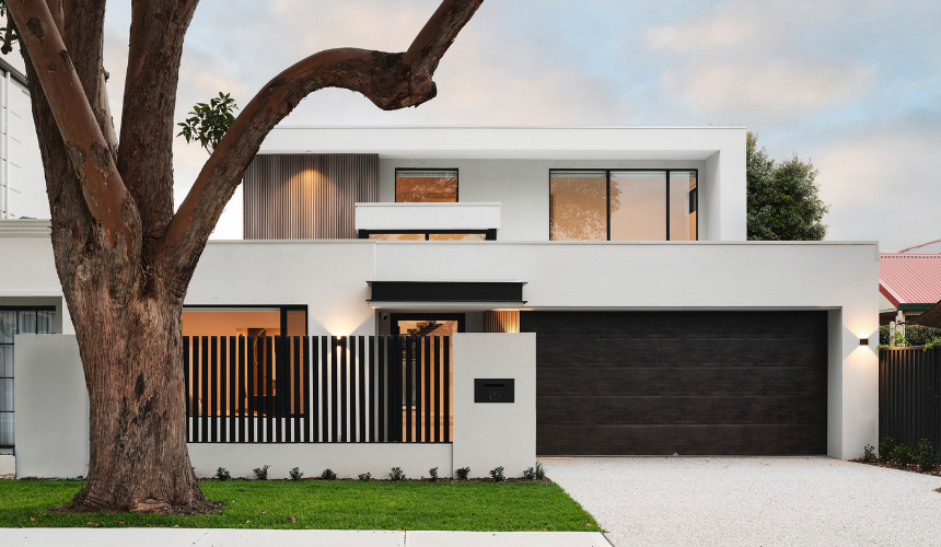 Contemporary Ardross custom home by Trendsetter Homes, with large windows and contrasting exterior finishes.
